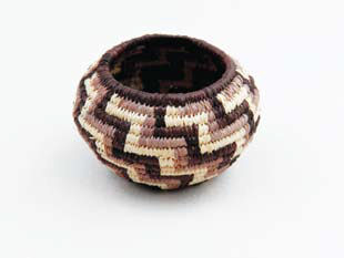 Geometric: Coiled basket, round reed core, wrapped with dyed raffia and natural raffia - Carol Emarthle-Douglas, Seminole/Northern Arapaho
